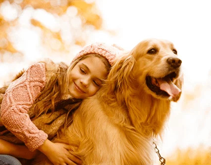 young-girl-hugging-golden-retriever_0.jpg 